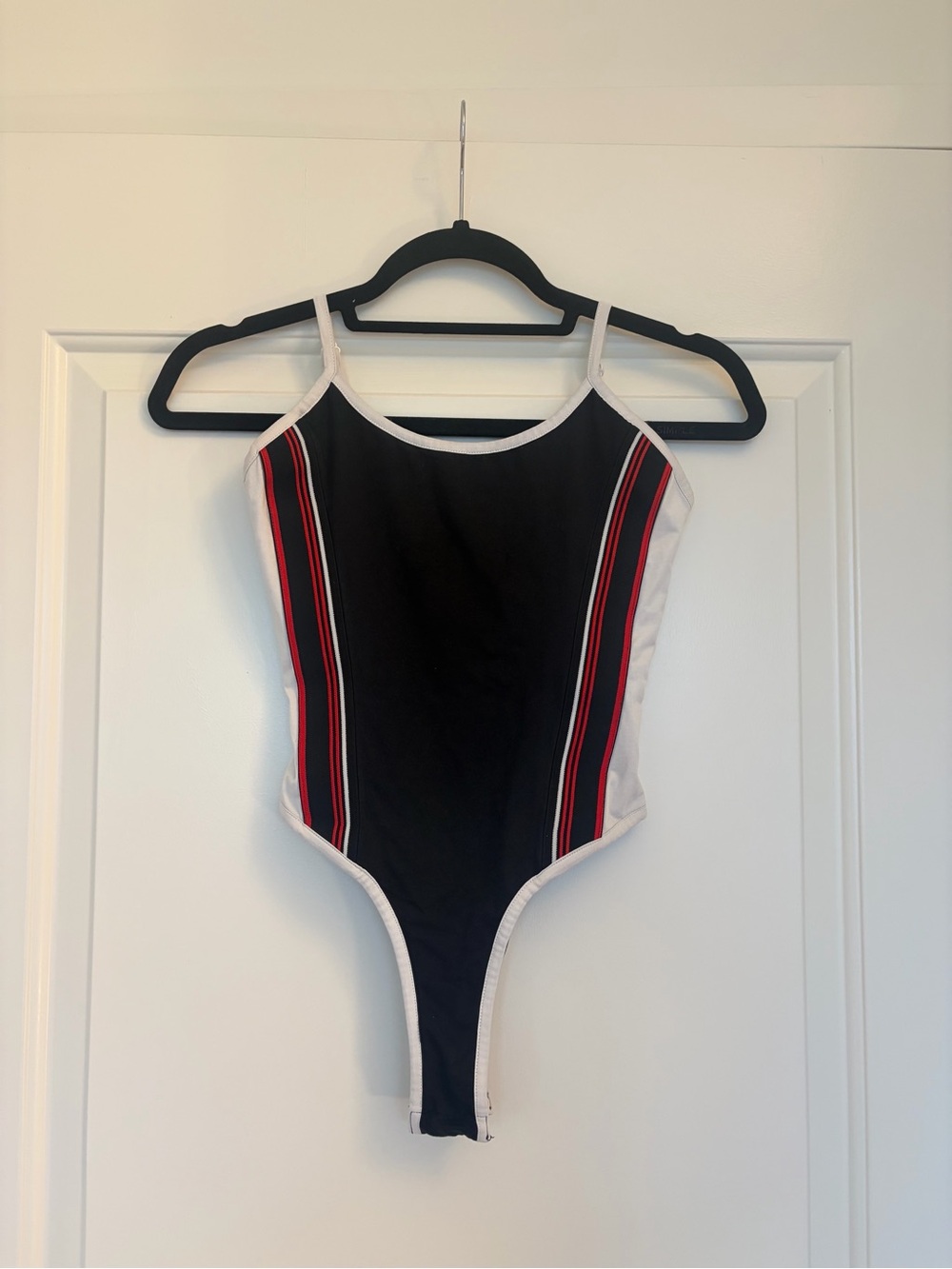 Tiger Mist Black Bodysuit with White Trim and Red and White Stripes